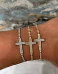 Bracciale tennis con croce dorato