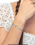 Bracciale catena snake piatta multifilo con bottone martellato